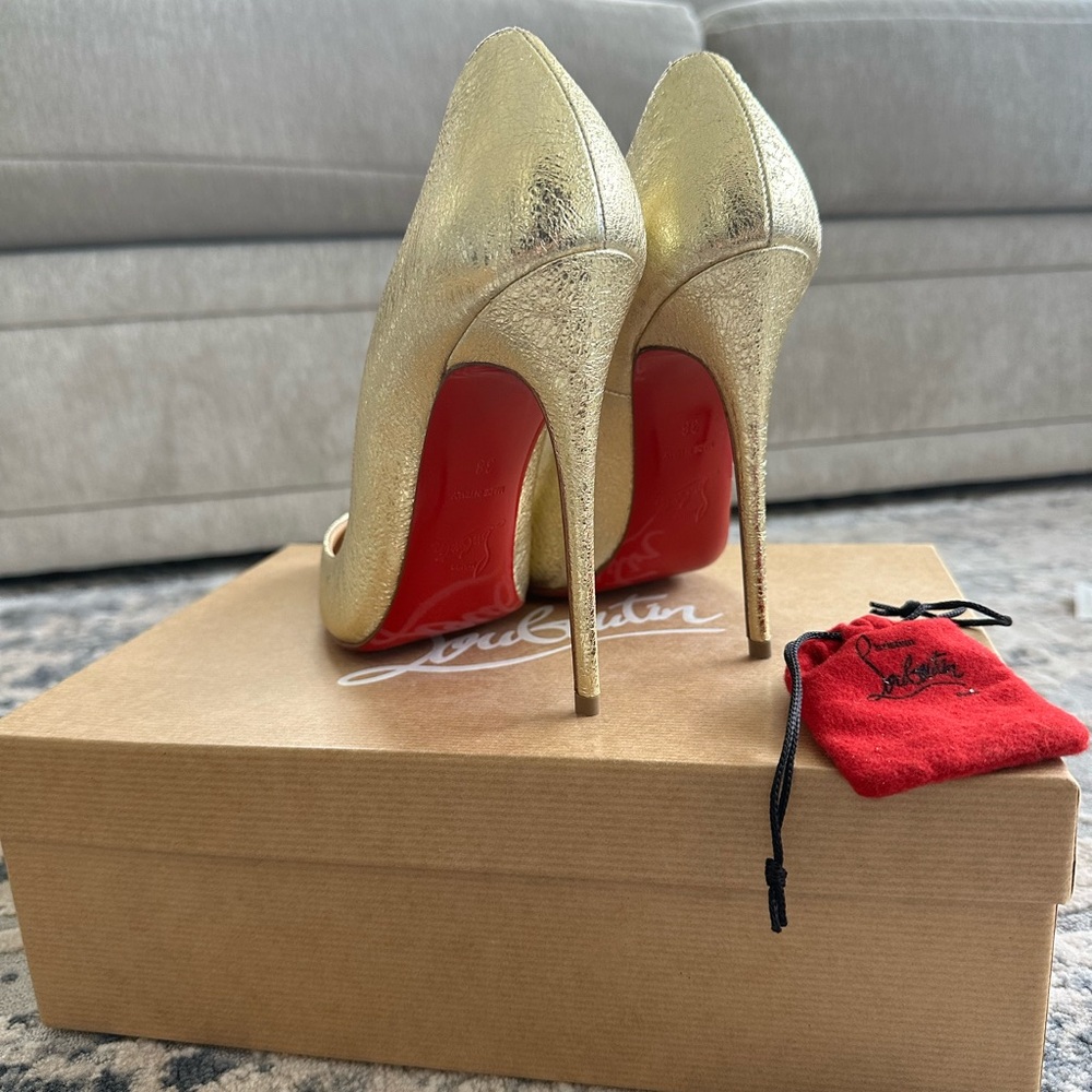 Christian Louboutin So Kate heels in metallic gold. SZ 38. 120mm NIB NEVER WORN